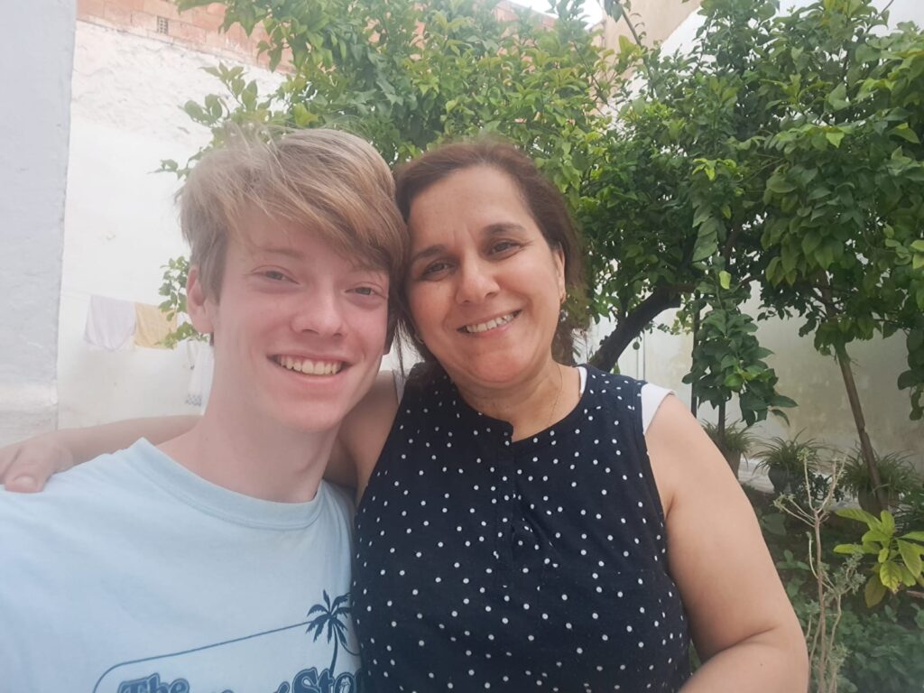 Dylan studied Arabic in Morocco while living with a host family. This is him and his host mother.